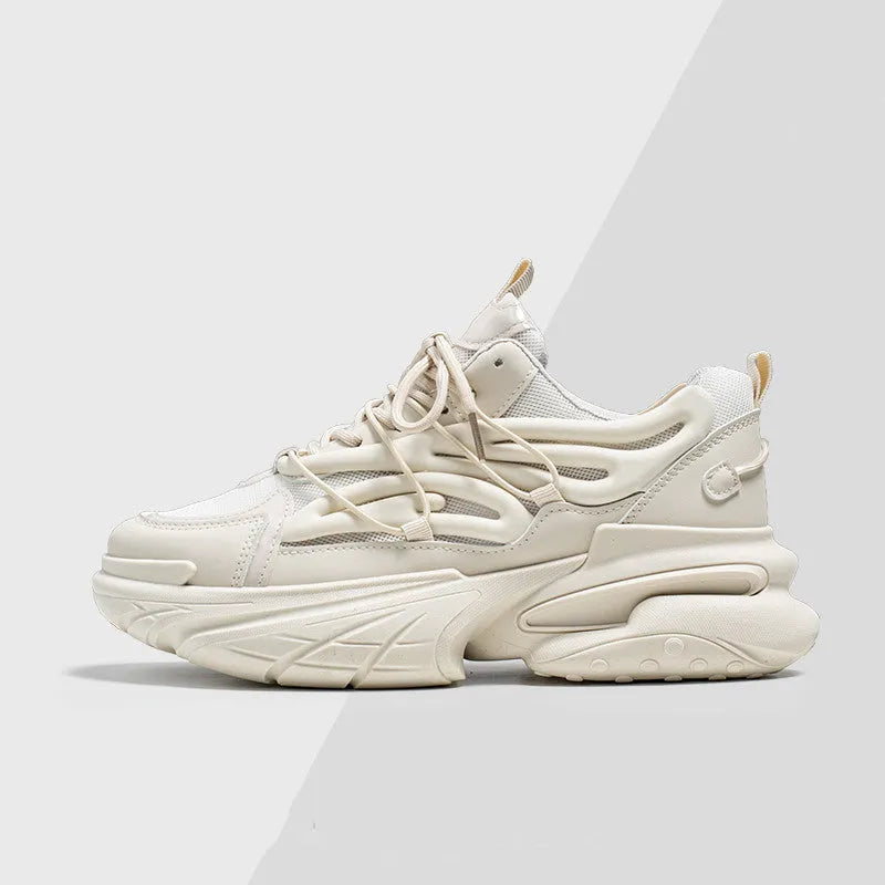Men's beige low-top lace-up sneaker with mesh upper and platform rubber sole.