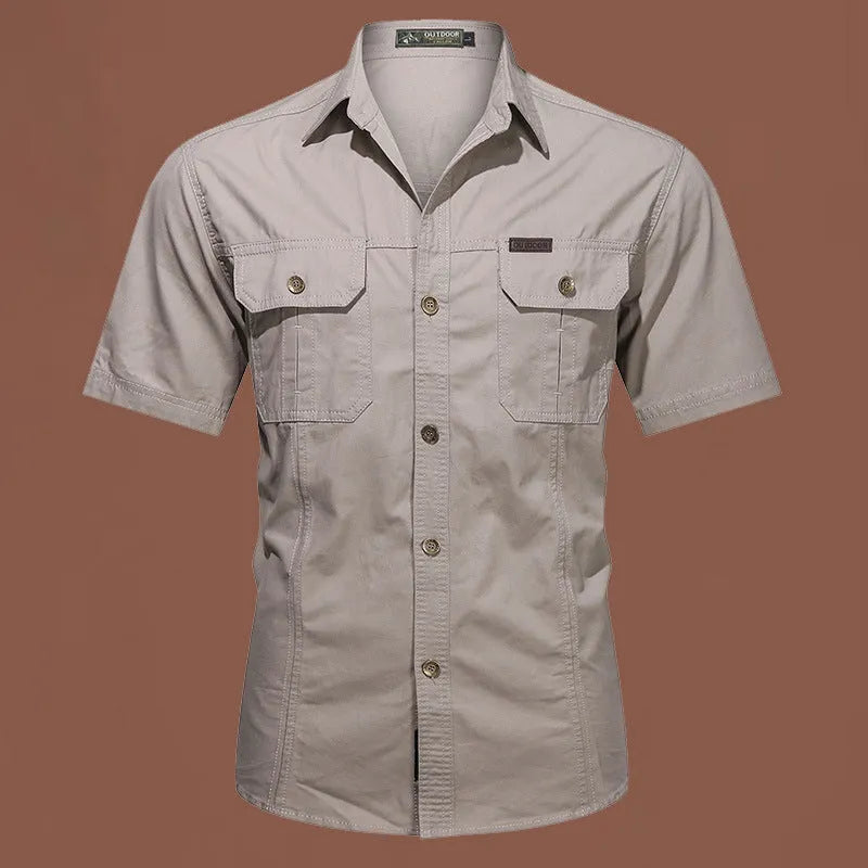 Men's army green cotton short sleeve work shirt with a cardigan style and loose fit.