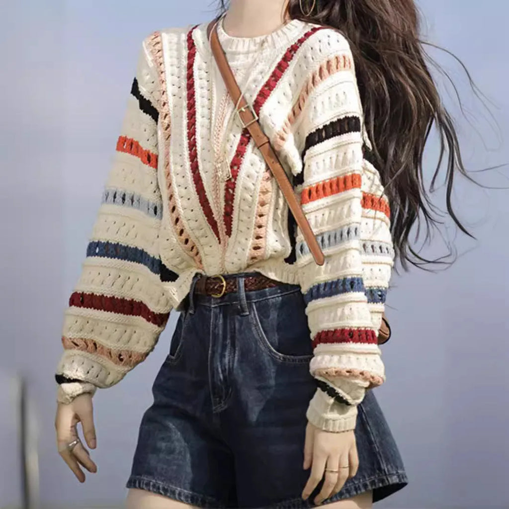 Rainbow striped sweater with batwing sleeves in loose fitting retro casual style