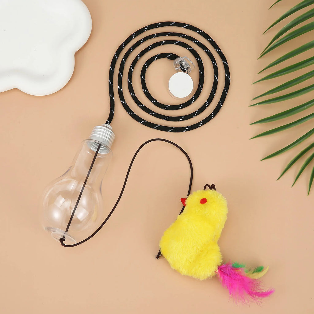 Retractable cat teaser toy hanging on door frame with dangling mouse toy and treat reward bulb
