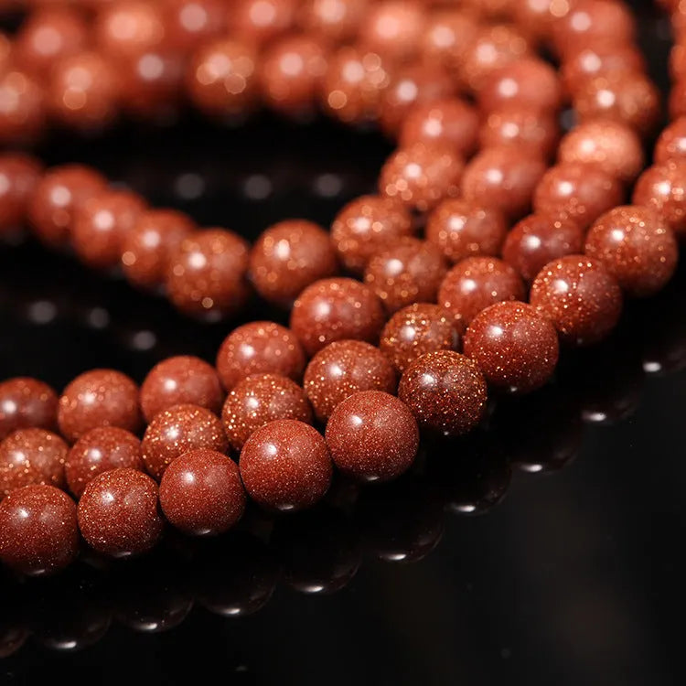 Golden star stone colour bracelet with 108 nugget sand pieces and six words mantra design