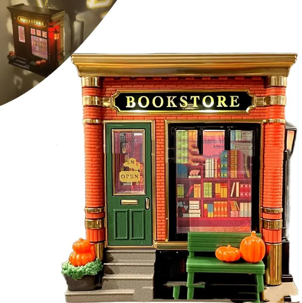Small white cartoon house night lamp ornament with red roof on wooden surface.