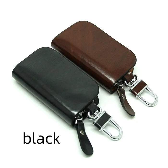 Genuine leather car key case in frosted black or brown with zipper closure