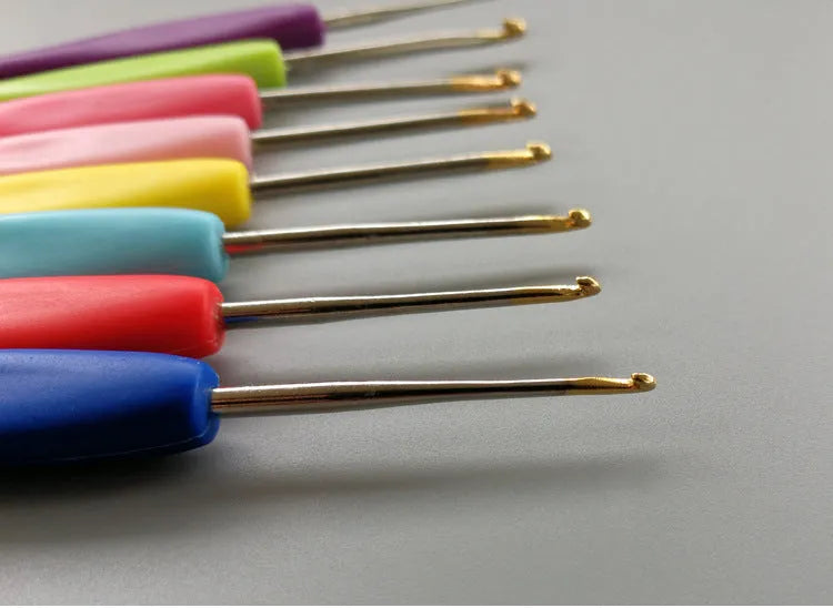 Set of 16 crochet hooks with different sized heads in a PU storage bag