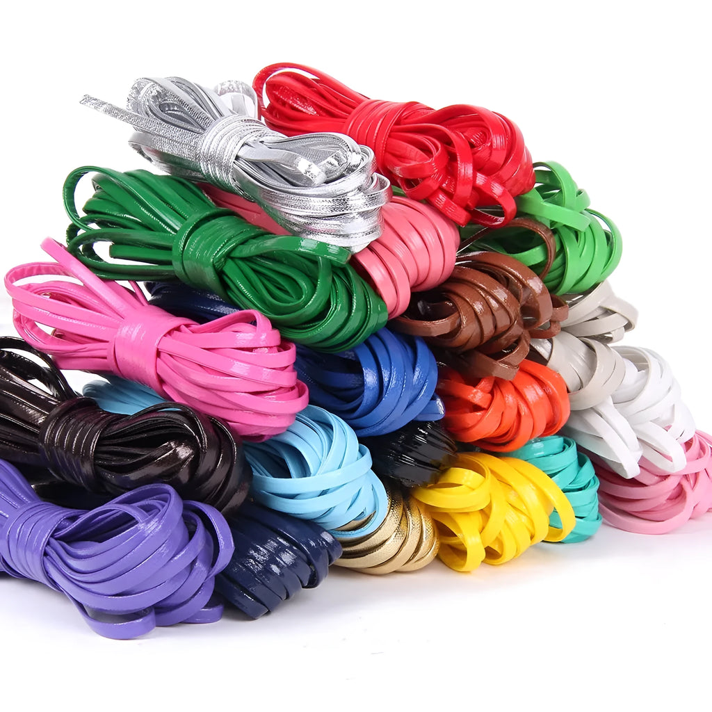 Coiled PU leather woven craft string in multiple colours including beige, black, red, blue, green, gold, and silver.