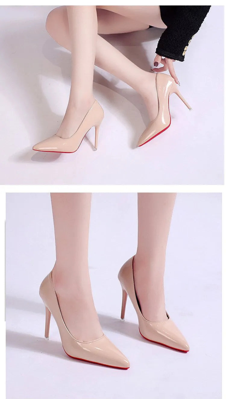 Women's black stiletto heel pointed toe pump shoe on a white background.