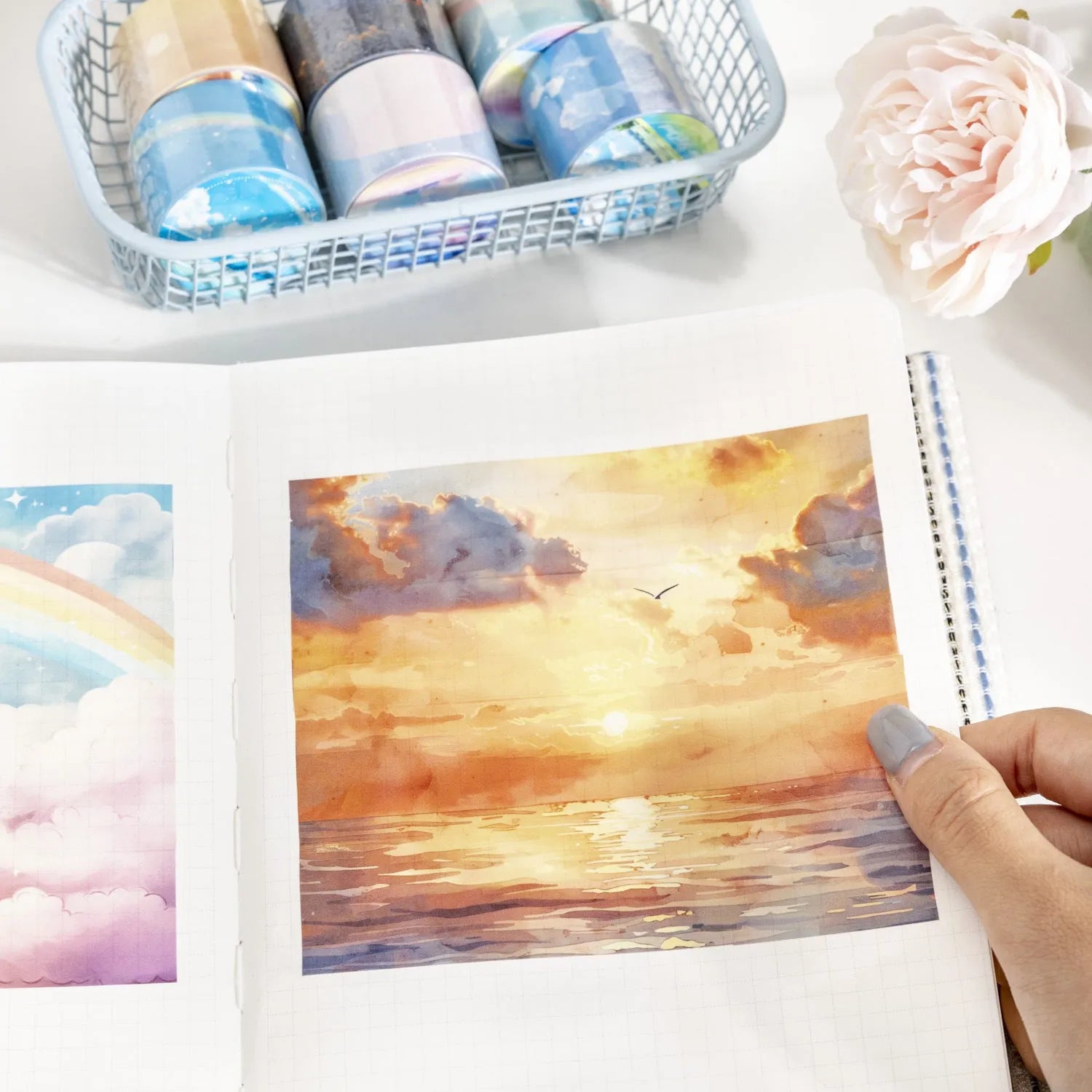 Japanese paper washi tape roll with sky theme designs including clouds, sun, twilight, moon, and nebula