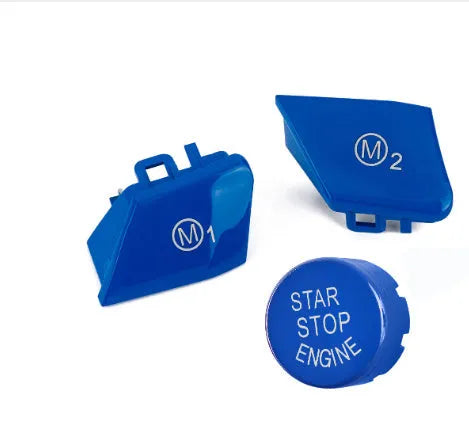 Pair of red M1 and M2 steering wheel mode button accessories for BMW cars