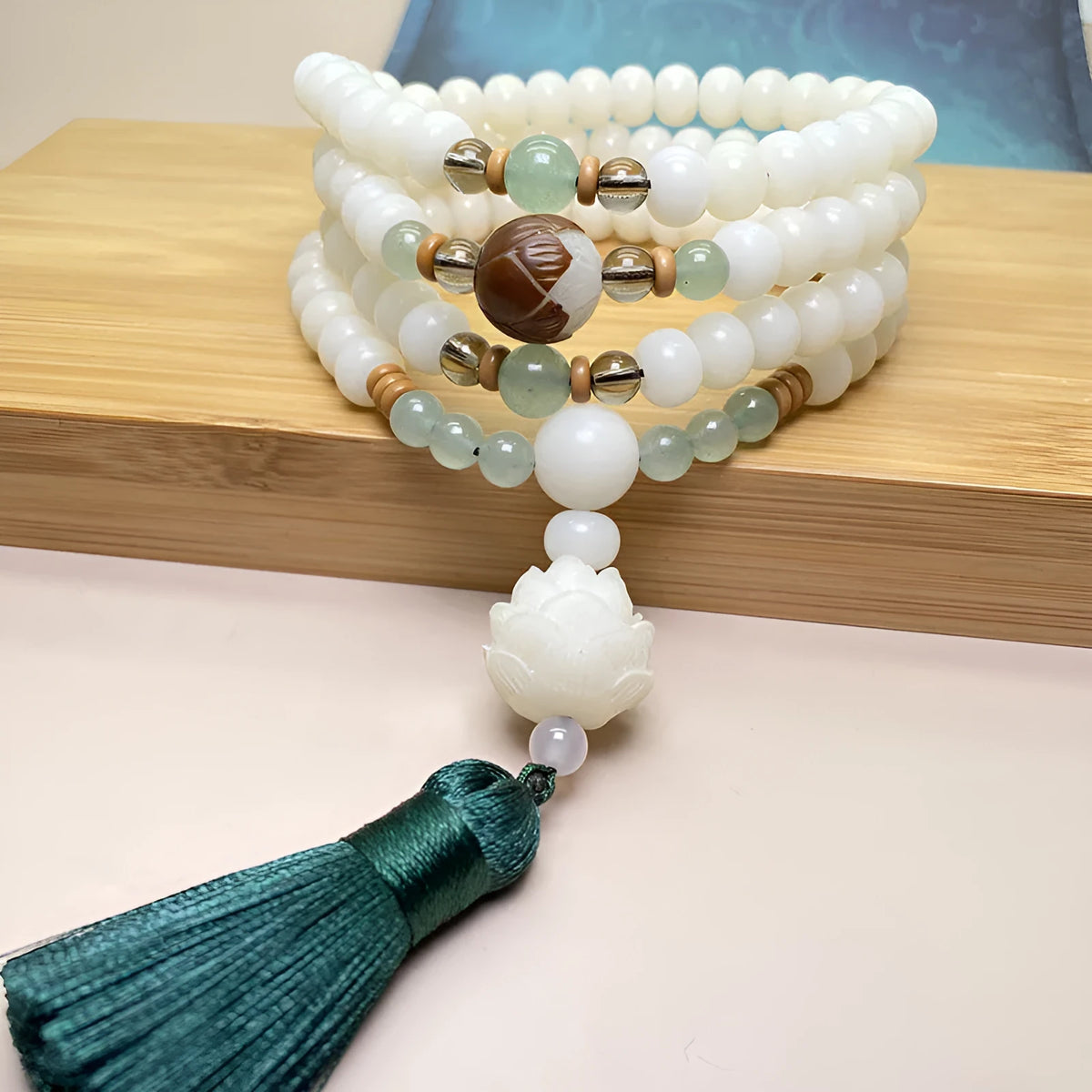 White Jade Bodhi 108-bead bracelet showing bead detail, offered in different styles and sizes.