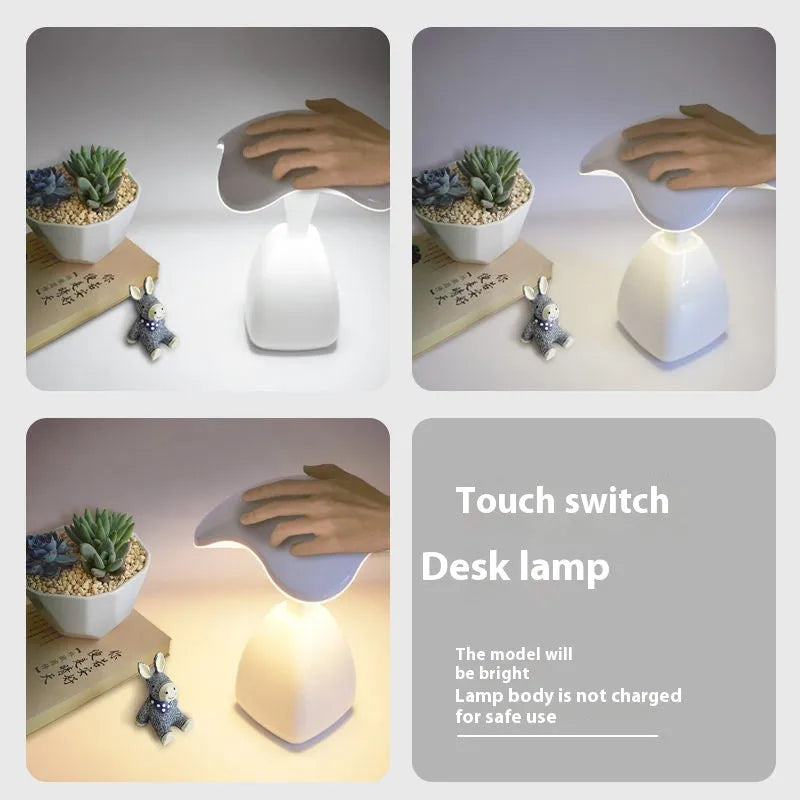 White plastic LED desk lamp with touch controls and built-in battery for bedside use