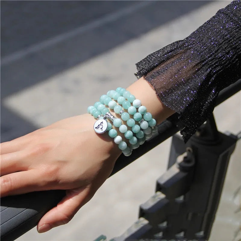 A vintage-style women's bracelet made from natural stone with a geometric lotus design.
