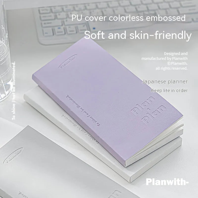 Embossed A5 daily meter notebook in blue, showing its 80 pages of 100g paper.