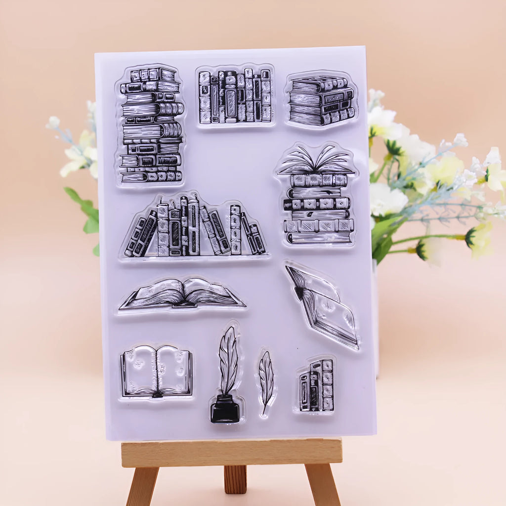 Transparent silicone stamp with a raised white seal pattern, measuring 11 by 16 centimetres.