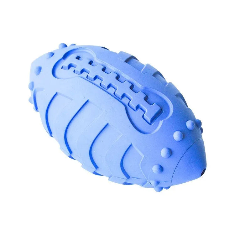 Light green rubber rugby ball dog chew toy with textured surface for teeth cleaning