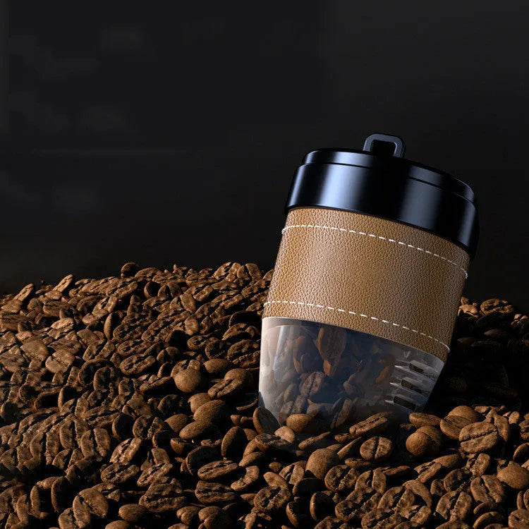 Cup-shaped car air freshener with coffee beans fragrance in plastic housing