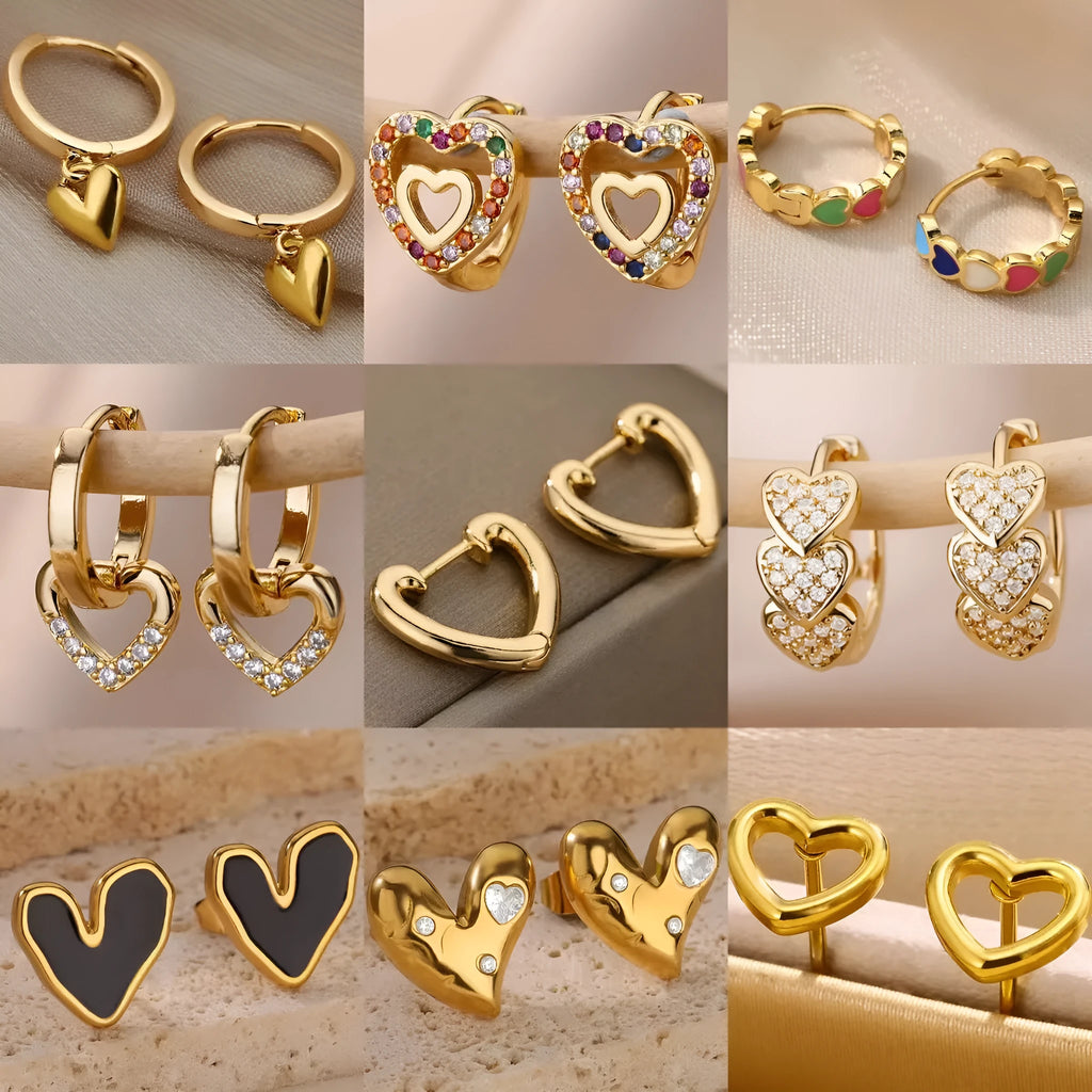Pair of heart shaped stainless steel stud earrings with 18K gold plating and zircon stone