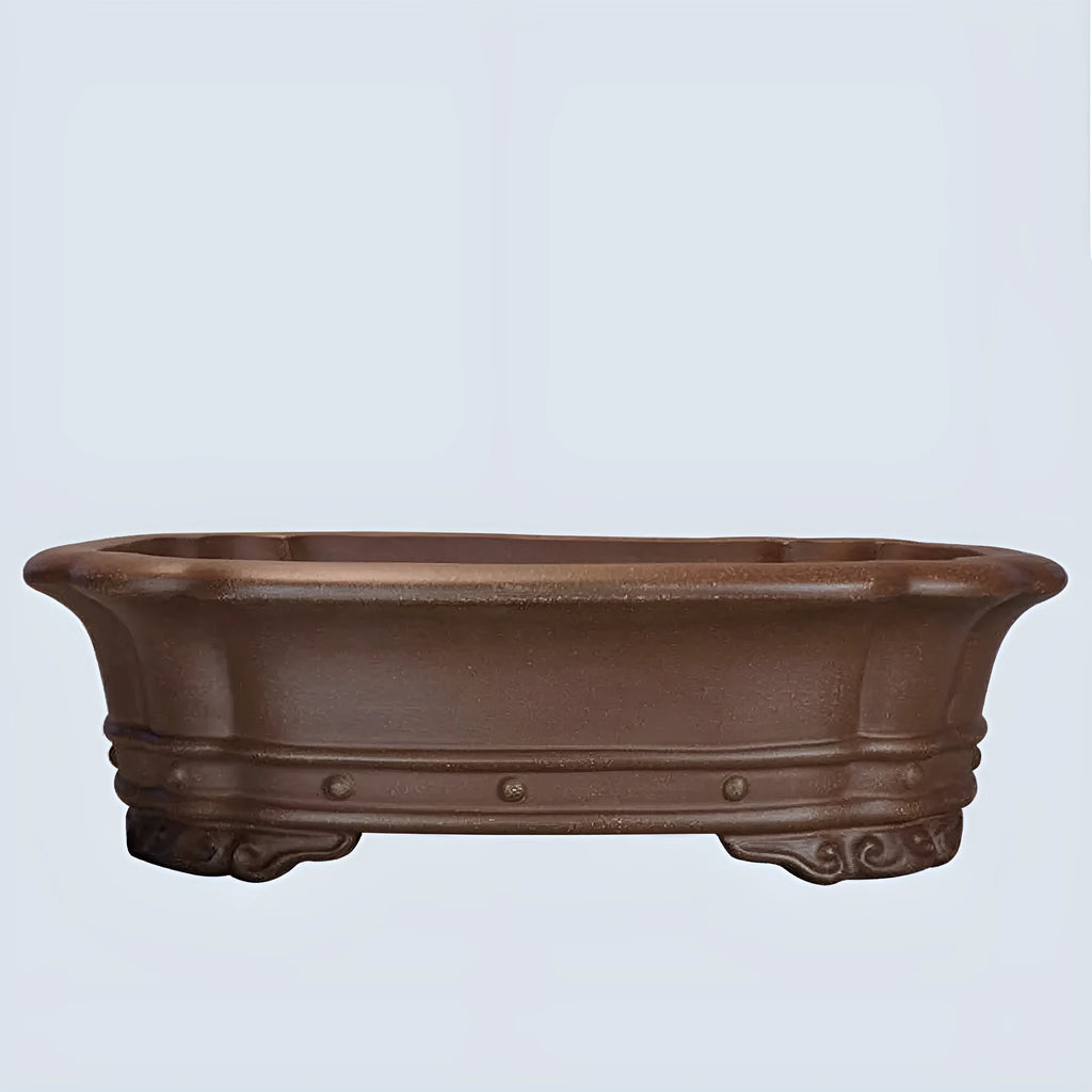 Handmade purple sand rectangular begonia flower pot on desktop