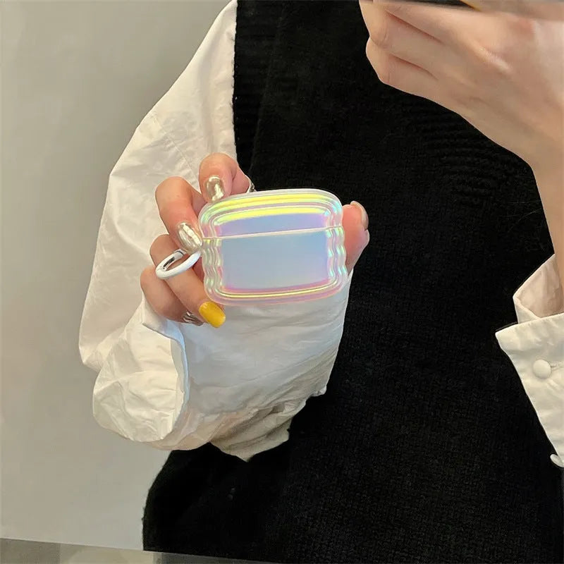 Silicone AirPods case with colourful laser engraving and ring detailing showing compatibility with multiple models