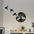Black electroplated iron wall hanging ornament with modern simple design, shown with included hanging strap