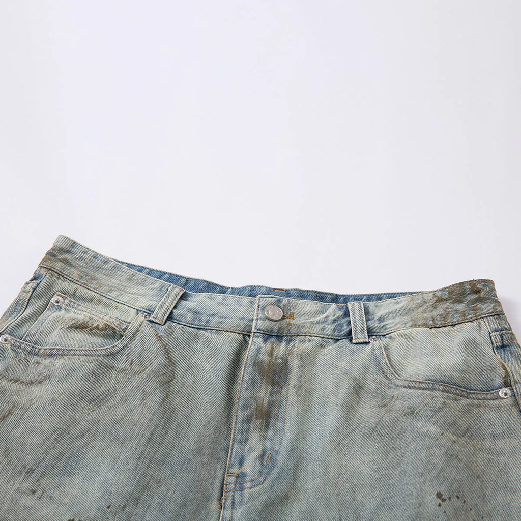 Blue cropped denim jeans with straight-leg cut and zipper fly on street fashion background