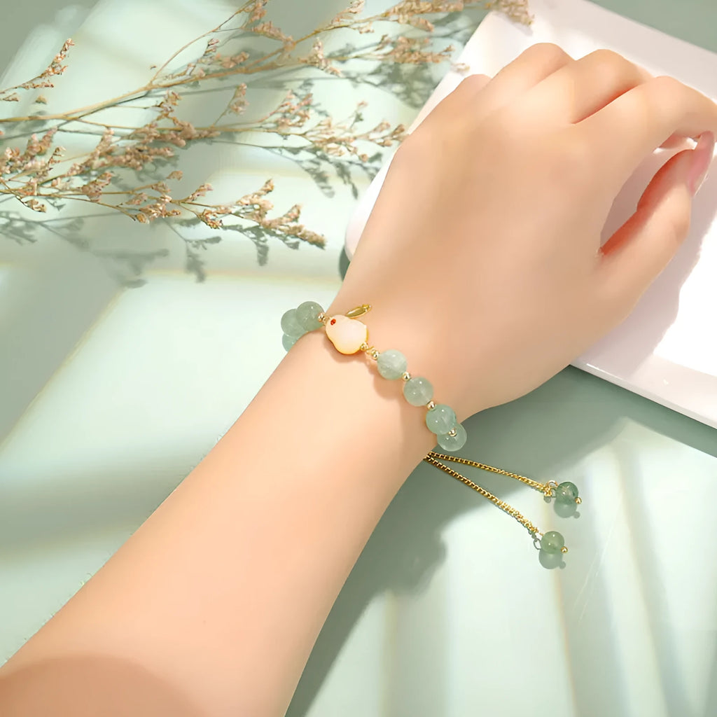 Rabbit charm bracelet with green aventurine or strawberry quartz stones on gold-plated chain