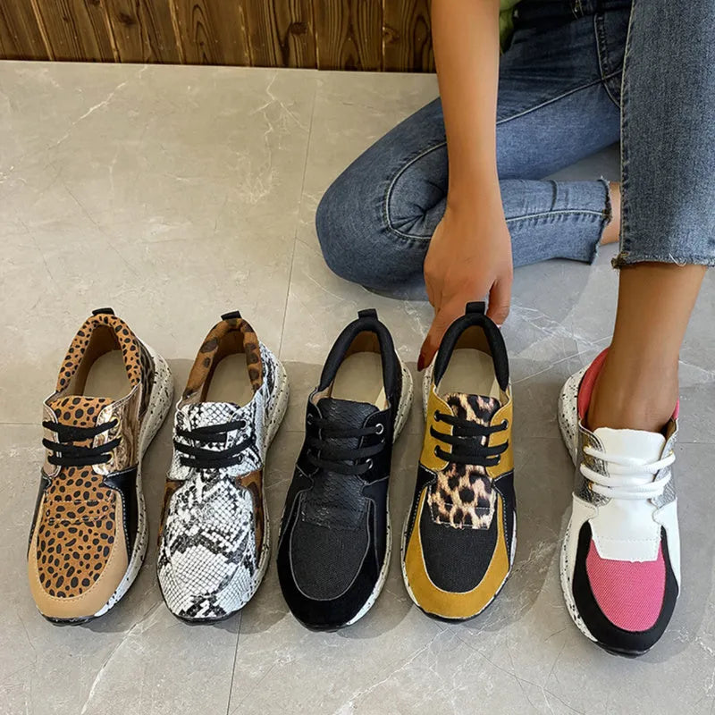Women's casual suede flat sneakers with wedge heel in black, leopard, pink, panther, and snake pattern options.