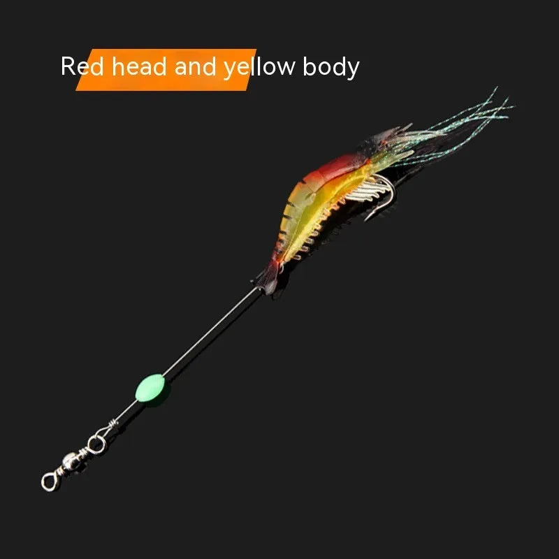 Soft plastic fishing lure with metal hook in black head yellow body colour variant