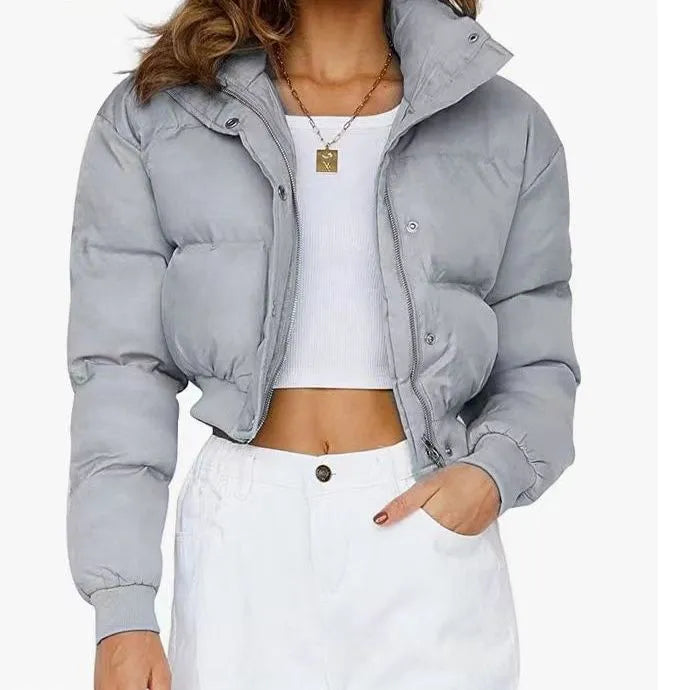 Women's loose fit polyester jacket in blue with long sleeves