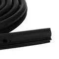 Black rubber sliding door seal for Toyota Hiace high roof, 5 metre length shown coiled