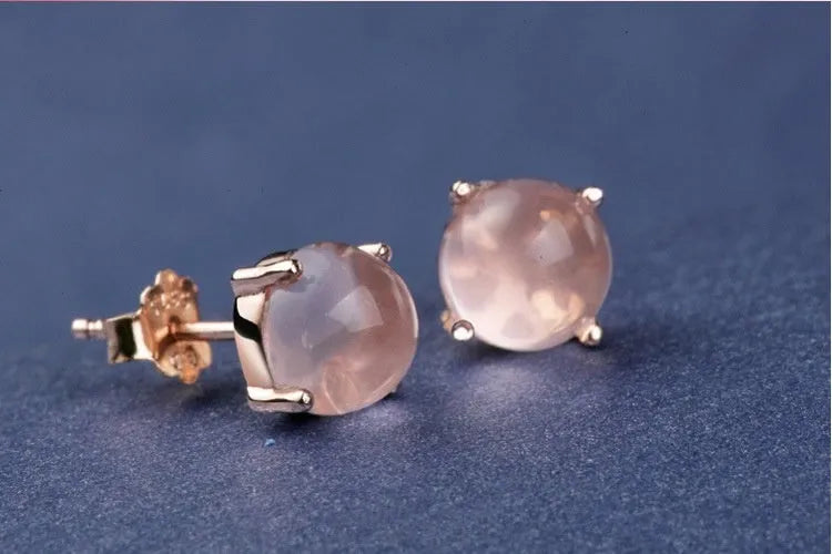 Women's rose gold drop shape stud earrings with synthetic ross quartz detailing and Korean style design