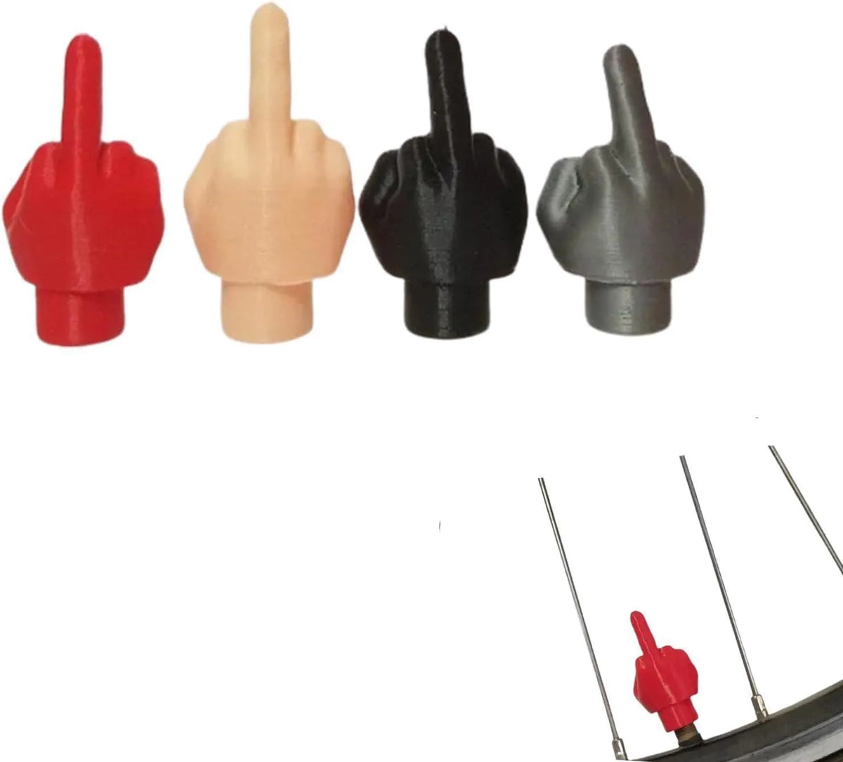 Four latex car tyre valve dust caps showing black and skin colour pieces for valve stem protection
