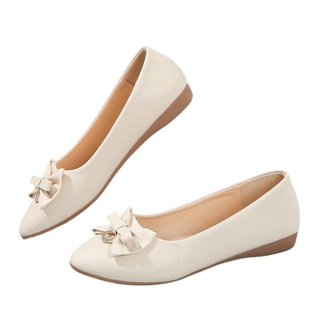 Women's flat casual beige shoes with a bowknot on the shallow mouth and a round toe.