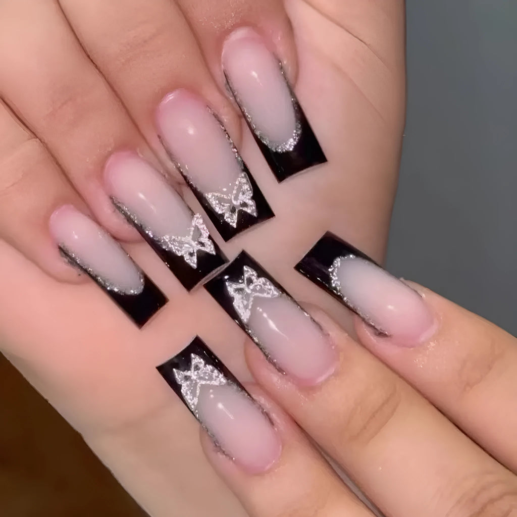 French style butterfly pattern false nails with glitter shimmer in medium length wear armour design