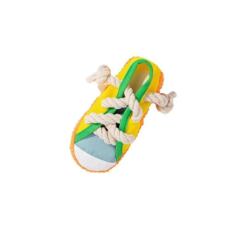 Squeaky plastic dog slipper chew toy in rock yellow, black and sea fog blue colours