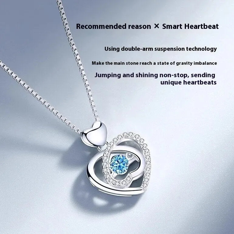 Blue diamond heart-shaped necklace and bracelet set with geometric pendant and mixed gem inlay on an adjustable copper chain.