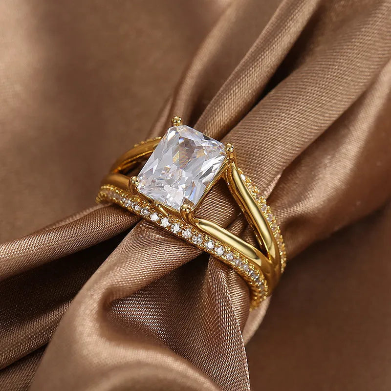 Geometric women's ring with square zircon stone on gold electroplated copper band