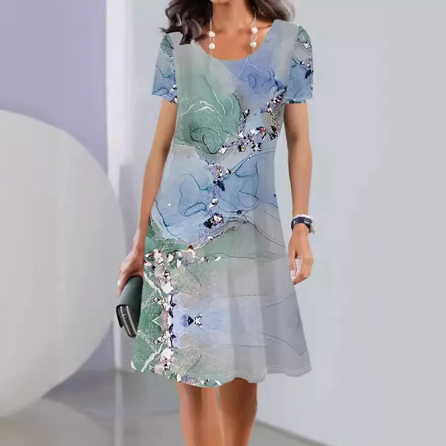 Lightweight ice silk A-line dress with a painted floral pattern, round neck, and short sleeves on a mannequin.
