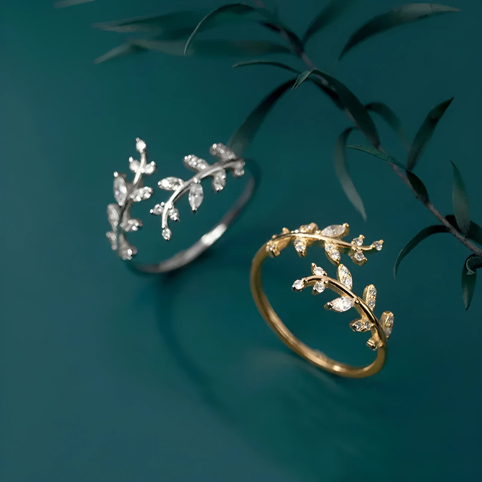 Women's leaf-shaped branch fashion ring in copper with gold or silver electroplated finish.