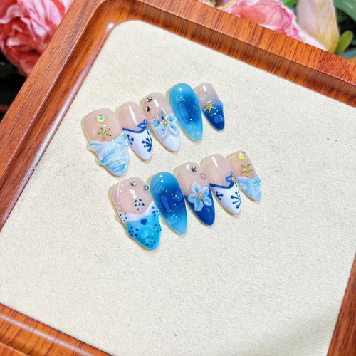 Blue hand-painted carved summer ice transparent plastic fake nails in four sizes