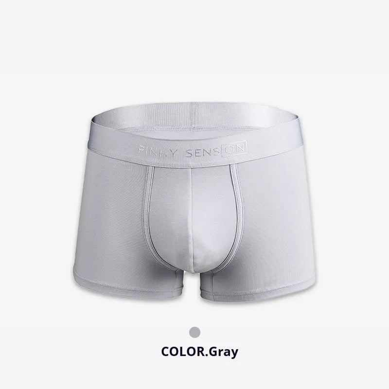 Men's solid colour cotton boxer shorts on a white background, showing available colours: black, white, silver grey, light green.