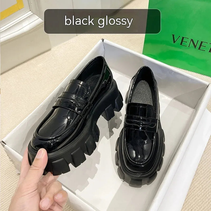 British style wide fit loafers in patent leather or matte finish with rubber sole.