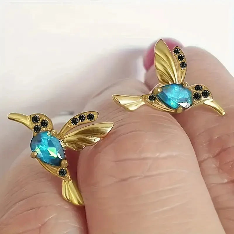 Long style bird hanging earrings with mixed zirconium wings in electroplated alloy construction