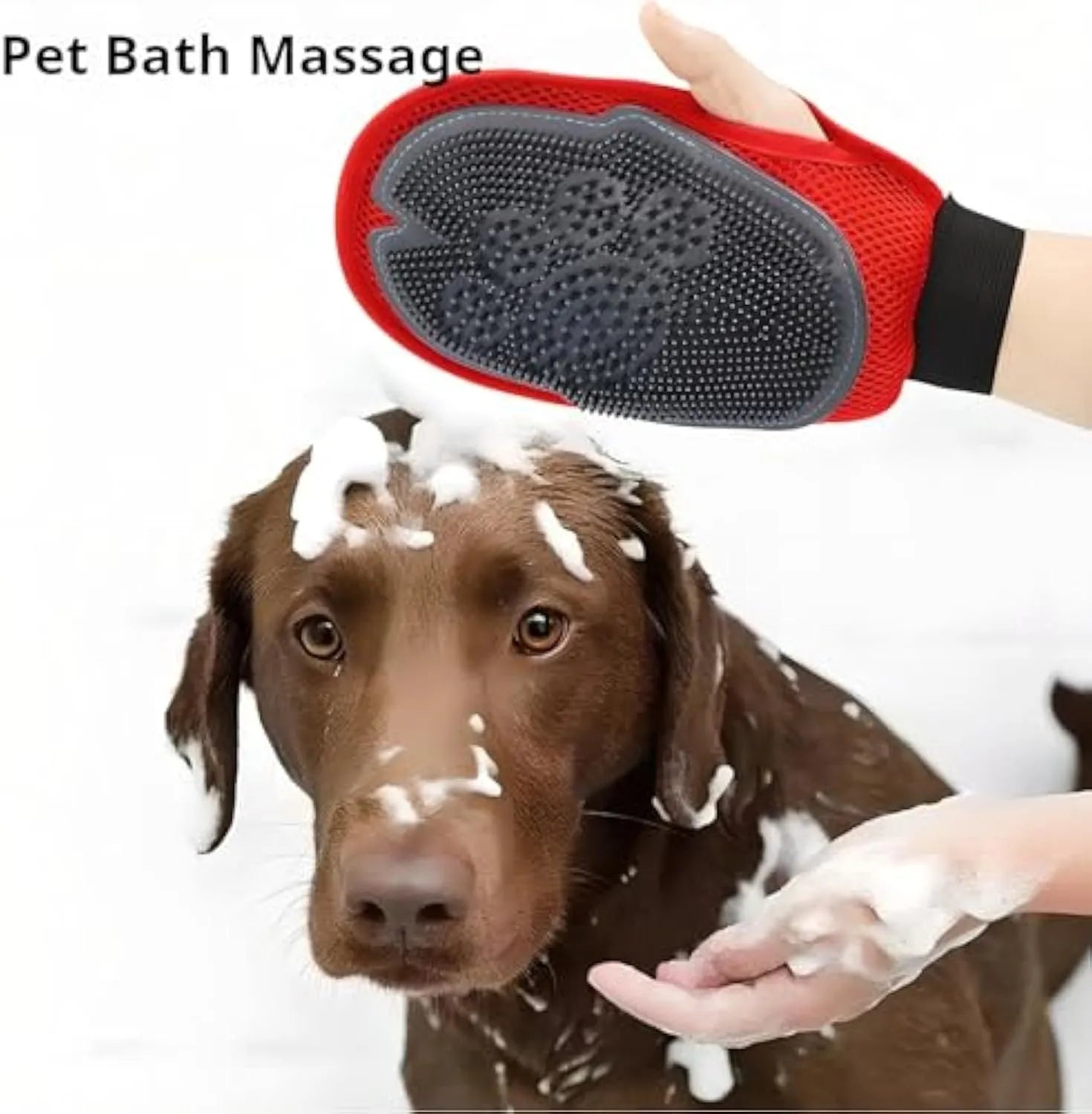 Red pet bathing glove with integrated brush for dog and cat grooming during washing.