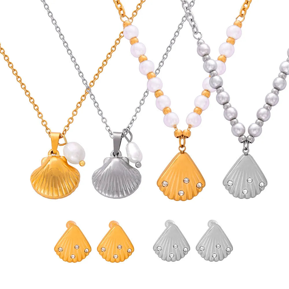 French vintage shell pendant necklace with freshwater pearl bead detail on O-chain