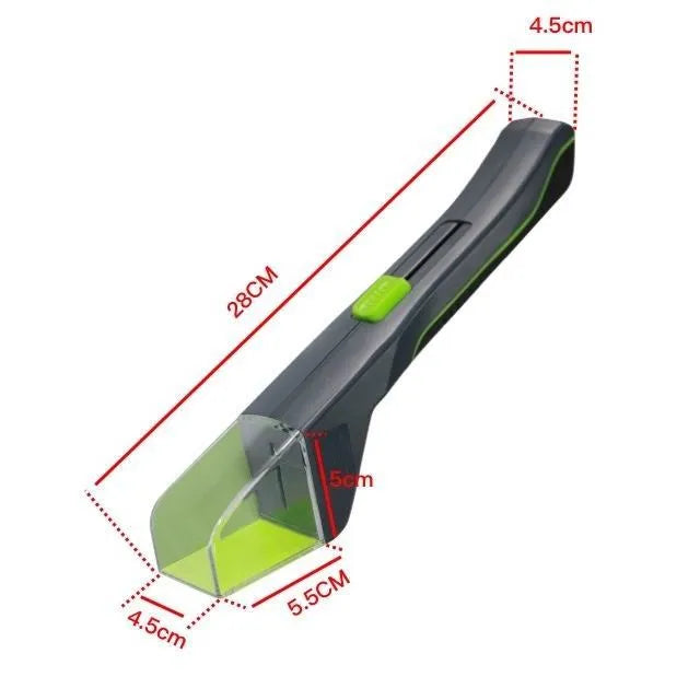 Green plastic handheld insect catcher for garden pest control on lawn