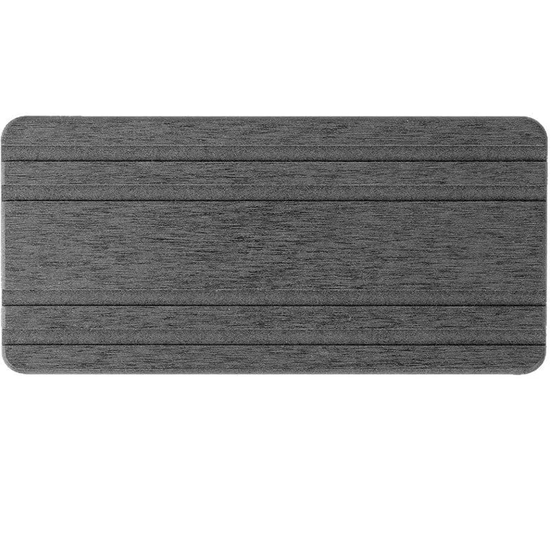 Three square diatom oil bathroom countertop drying mats in solid colours on a bathroom vanity