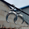 Silver gothic moon hoop earrings with geometric punk design and ear clip fastening