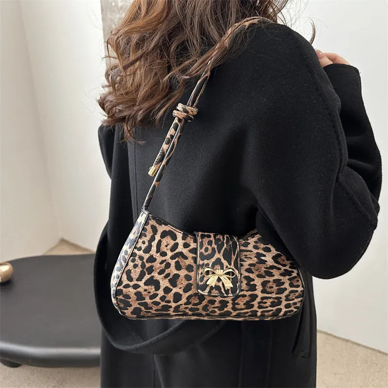 Large casual women's PU leather handbag with outer sandwich pockets in black, brown, coffee, or khaki.