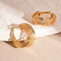 Geometric women's hollow stud earrings with twisted round design in silver or gold electroplated finish