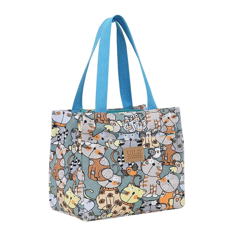 Women's printed canvas handbag with aluminium frame in horizontal square shape